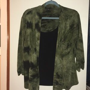 Green print attached jacket over black shell